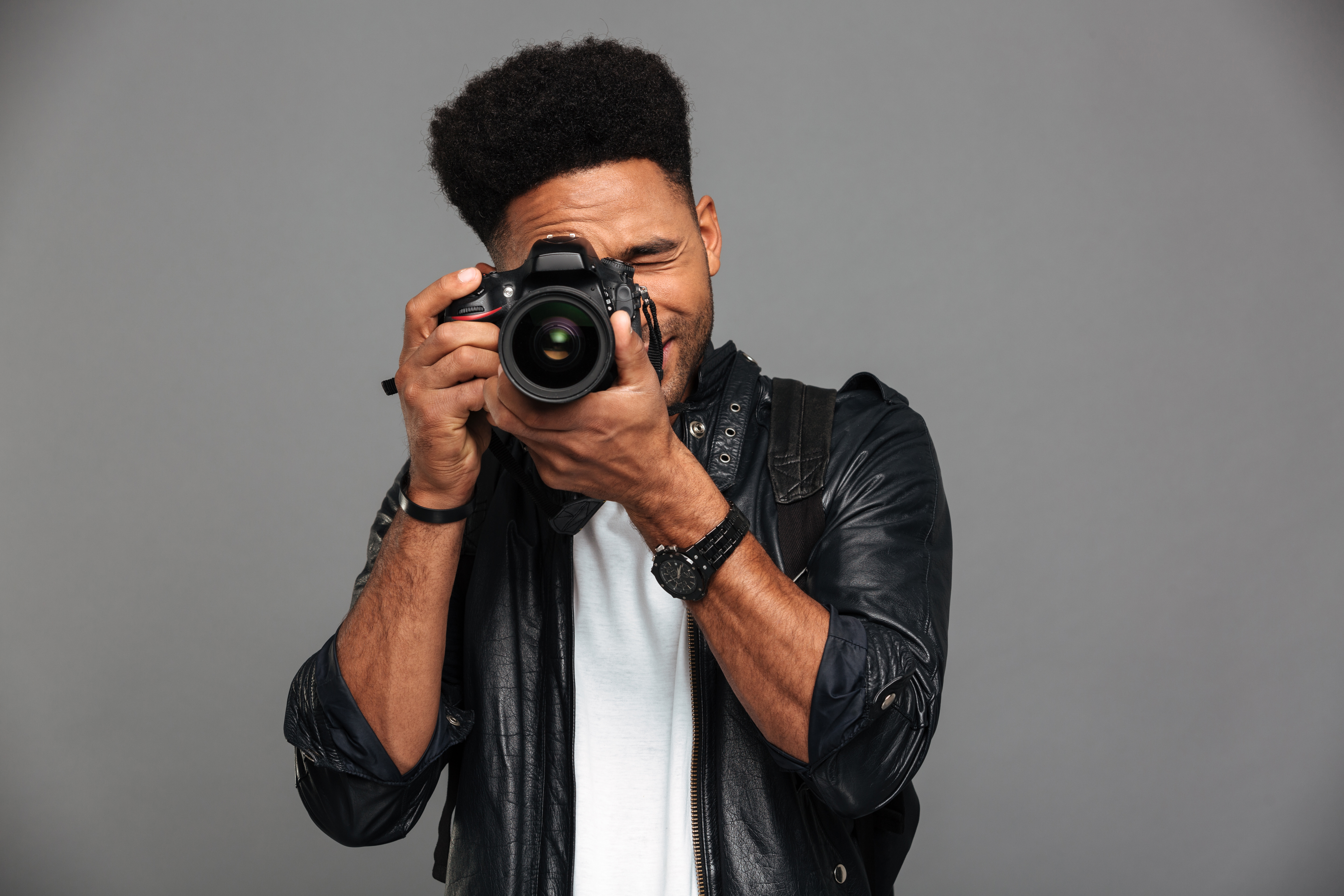 handsome-african-guy-with-stylish-haircut-taking-photo-digital-camera.jpg (11.19 MB)